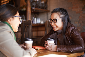 women getting coffee together