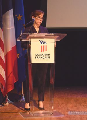 Sadina Montani speaking at podium