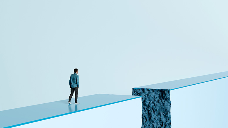 Man walking over gap