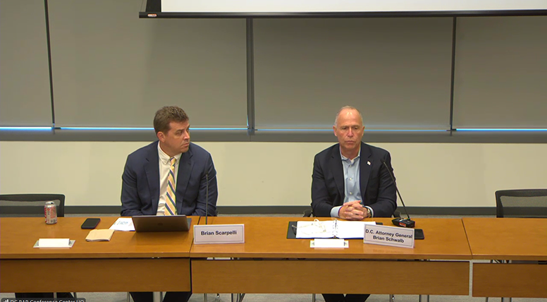 Brian Scarpelli of the Antitrust and Consumer Law Community (left) and D.C. Attorney General Brian Schwalb